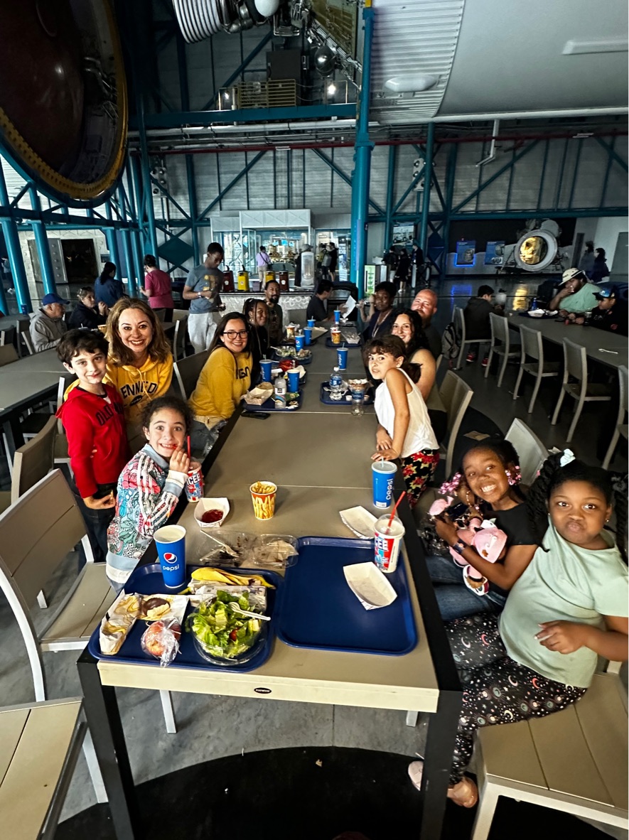 Kids getting lunch in the space center