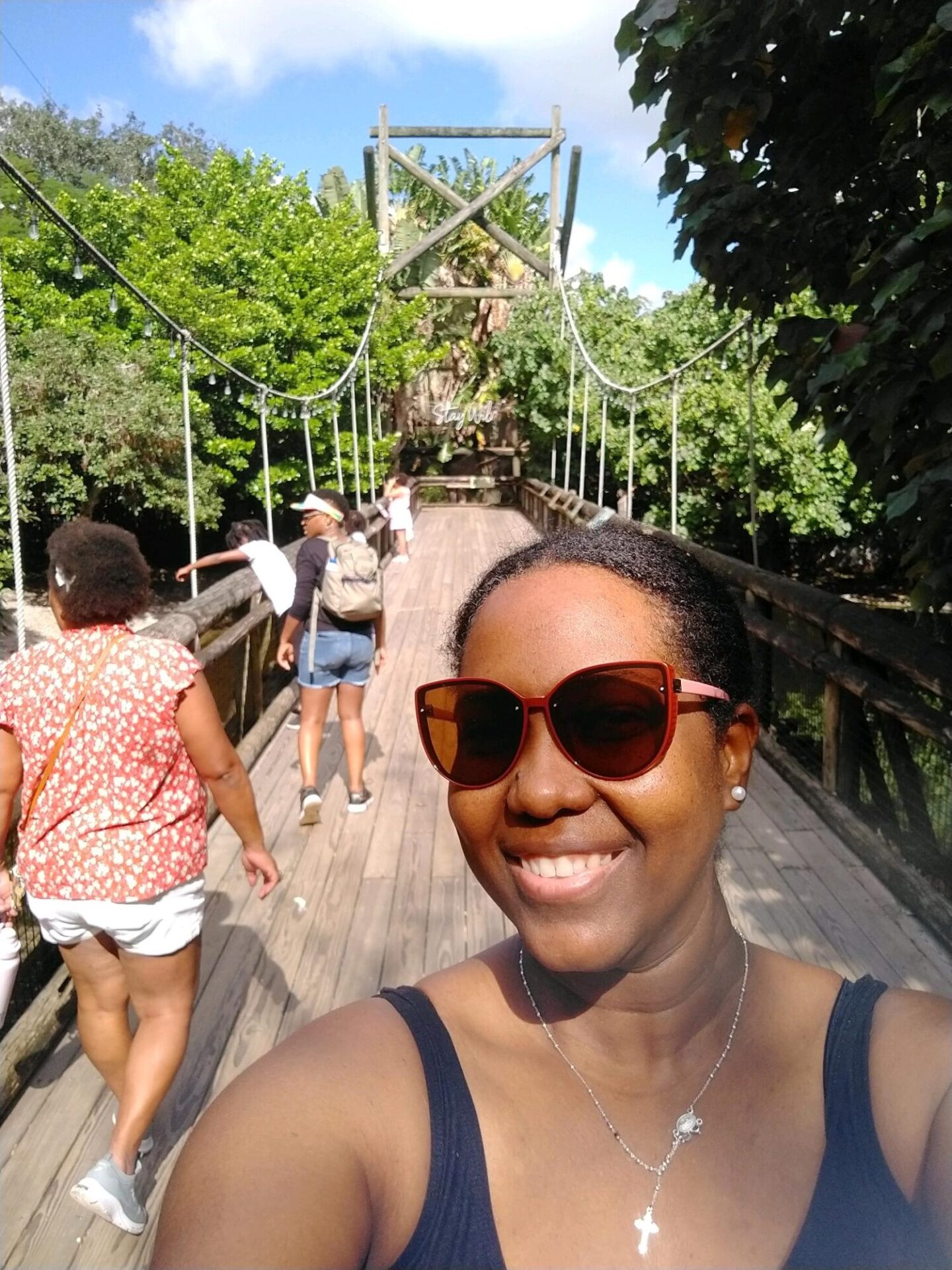 happy woman on the zoo bridge