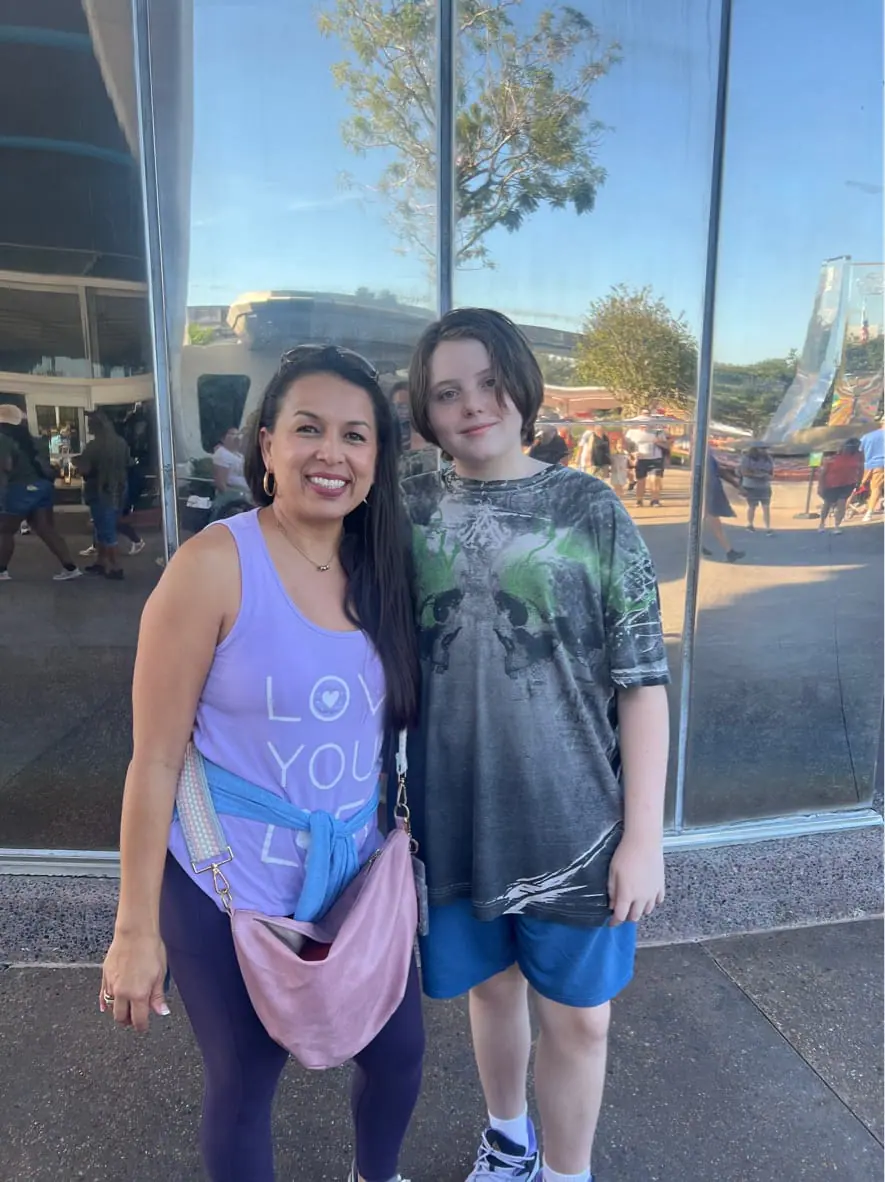 teacher with student in the park