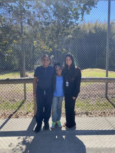 students smiling in the park