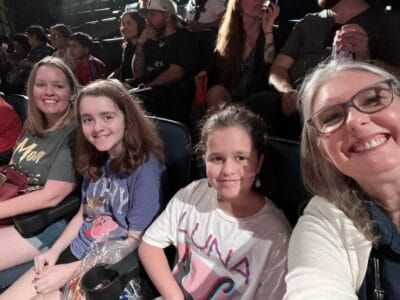 students with teacher selfie