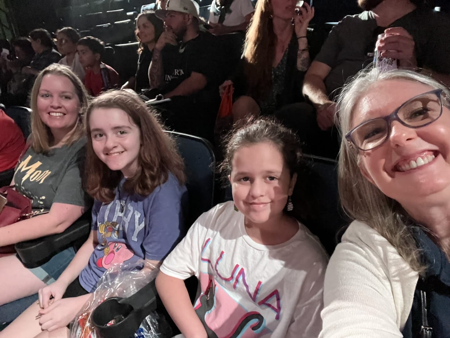 students with teacher selfie