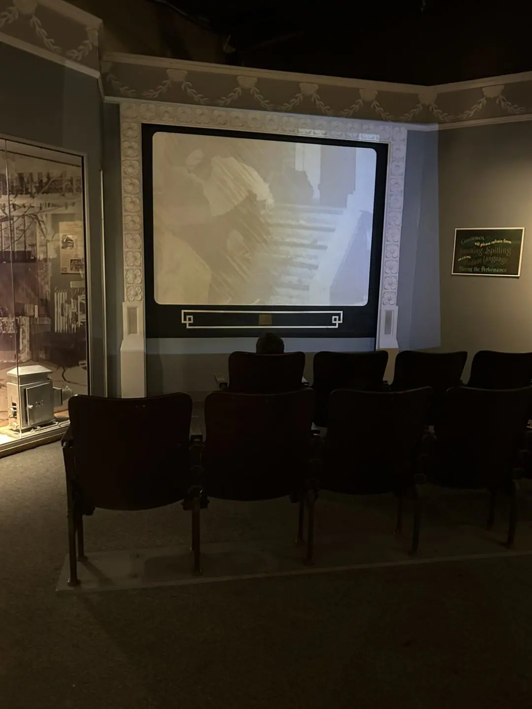 A wall with a s projection on it.