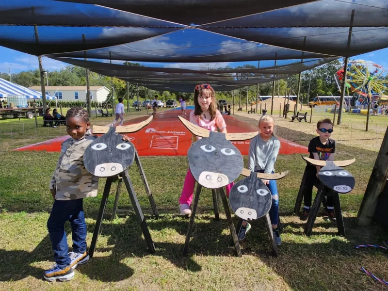 Kids in the toy horse