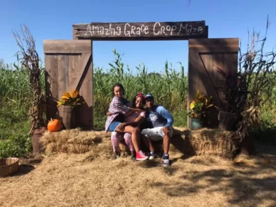 Parents with daughter in the farm