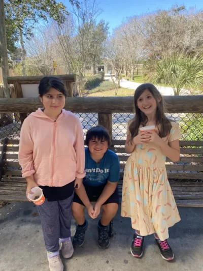 happy students in the zoo