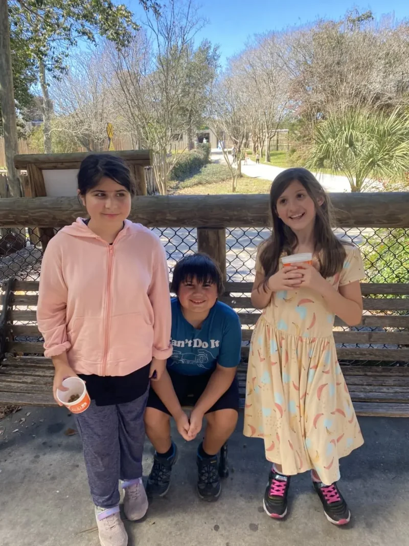 happy students in the zoo