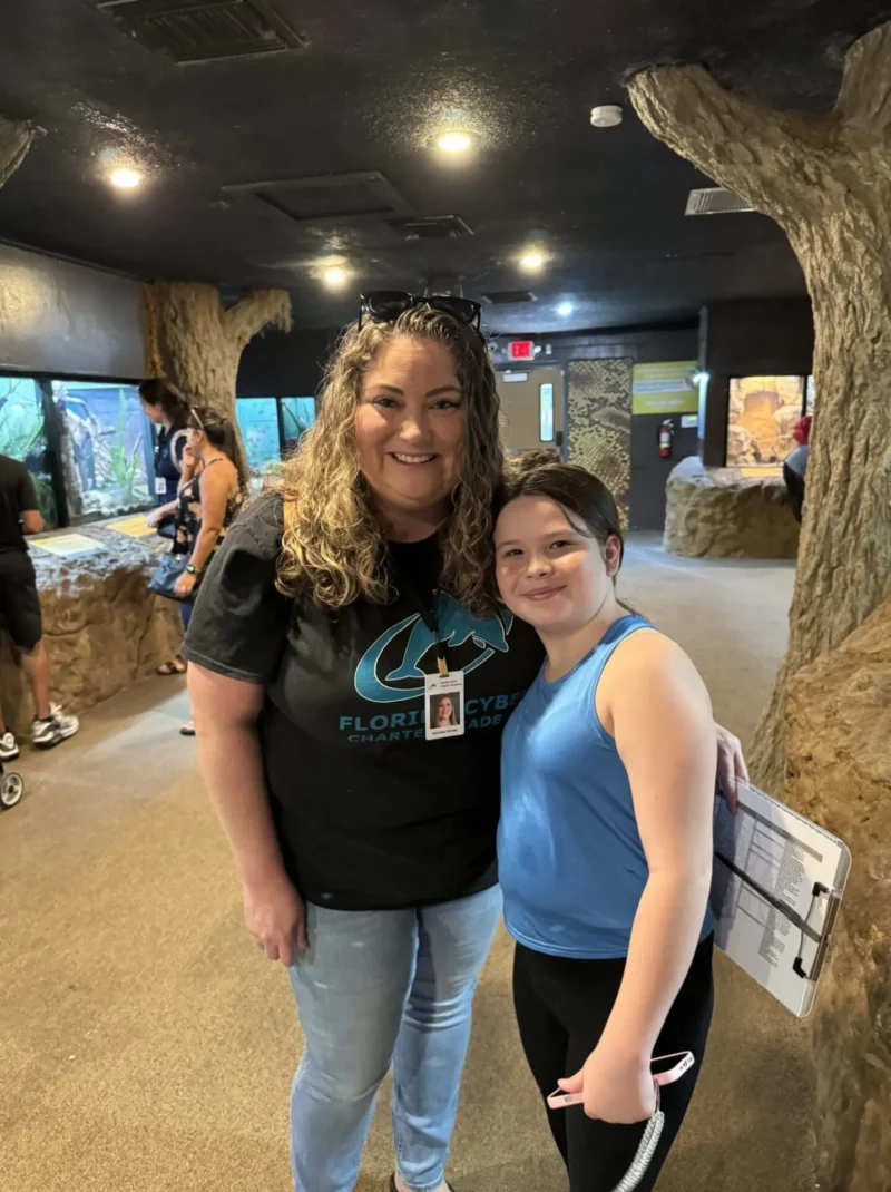 teacher with student in the zoo