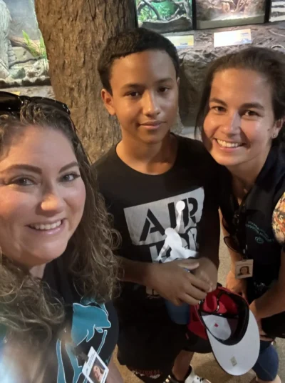 boy with teachers in the zoo