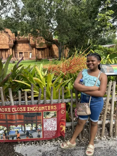 Girl smiling at the zoo